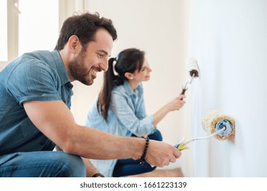 Renovation Diy Paint Couple In New Home Painting Wall Together