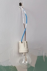 Renovation Object, - Small Bulb Hanging On Bare Wires, White Background.