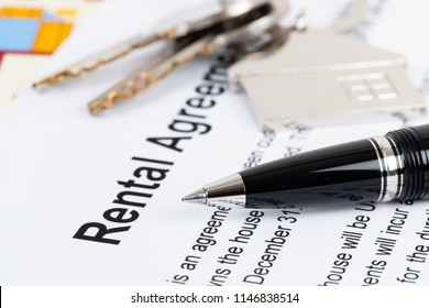 Rental agreement paperwork; document is mock-up - Shutterstock ID 1146838514