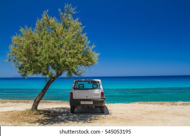 A Rental Car Parking At The Beach Near Tropea / Italy