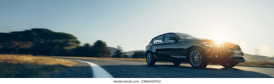 rental car in spain mountain landscape road at sunset - Powered by Shutterstock