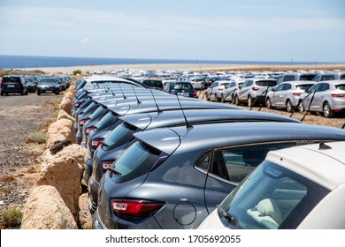 Rental Cars In Tenerife Parked Outside The Airport During The Coronavirus Crisis. Pandemic Time And No Tourist Left 40 000 Cars Unused