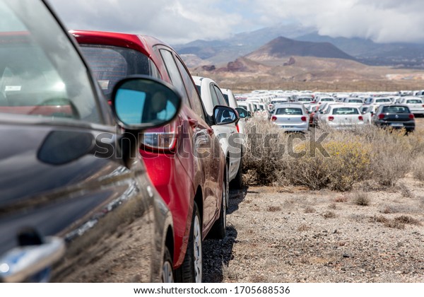 Rental cars in Tenerife parked outside the airport
during the coronavirus crisis. Pandemic time and no tourist left 40
000 cars unused