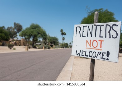 Renters Not Welcome Sign Concept Image On Residential Street.   Unhappy Neighbors Create A Notice To Show Their Anger At Noise And Anti Social Behavior From Vacationers Staying On The Street.