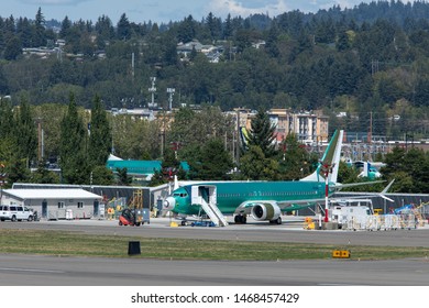 Renton, Washington / USA - July 31 2019: Grounded Boeing 737 MAX Airliner Parked On The Tarmac Of The Renton Factory, With Space For Text On Top