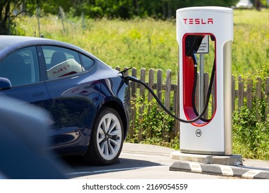 Reocin, Spain - May 29, 2022: Tesla supercharger fast charging station for electric vehicles of the Tesla brand