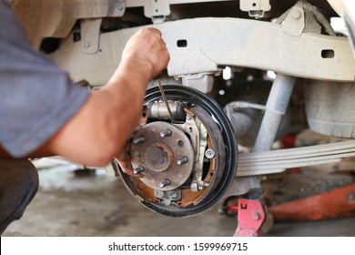 Repair and Adjust Car Drum Break - Shutterstock ID 1599969715