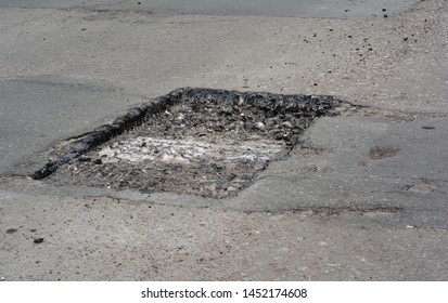 Repair Asphalt Road Pavement Hole And Laying New Asphalt Patching Method Outdoors