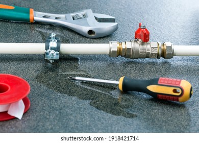 Repair Broken Of A Water Pipe In Bathroom Or Kitchen. Repair Plumbing Concept.