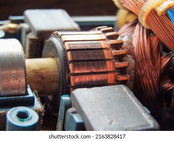Repair of the brush electric motor. The device of the collector brush assembly of the electric motor. Rotor, collector, brushes rotor from an electric motor, close up.