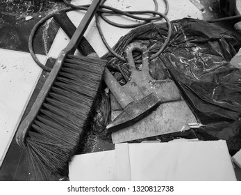 Repair building and hammer with a brush and trowel on the floor - Shutterstock ID 1320812738