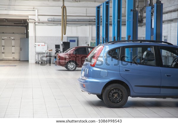 repair\
cars at a service station. maintenance of\
vehicles