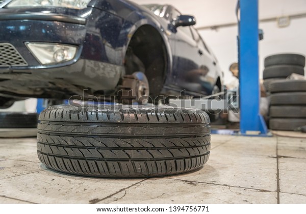 Repair and check\
car in repair shop. An experienced technician repairs the faulty\
part of the car. I change\
tires