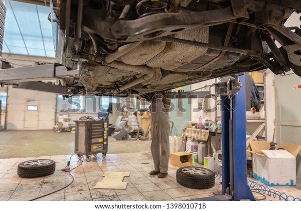 Repair and check car in repair\
shop. An experienced technician repairs the faulty part of the car.\
 