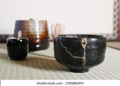 A Repair Of Crack Pottery Tea Cup  At Japanese Tea Room
