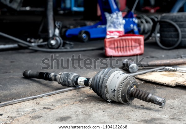 Repair drive\
shaft (CV Joint),Car\
maintenance.