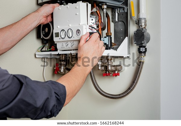 Repair of a gas\
boiler.