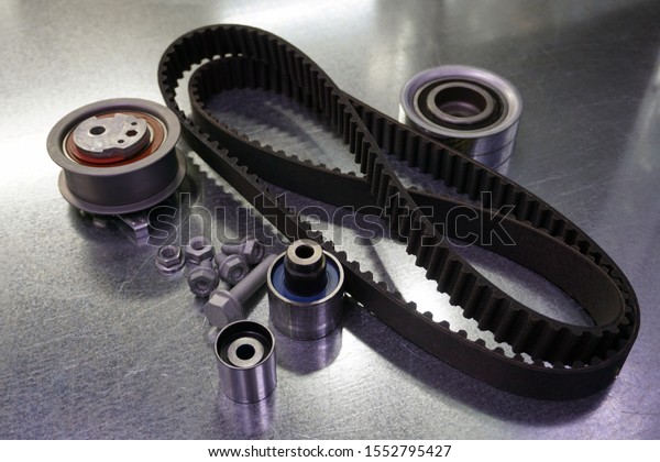 Repair kit for\
replacing the timing belt. The kit consists of a timing belt, a\
tension roller, a bypass roller, a set of fasteners. Spare parts\
for the repair of a modern\
car.
