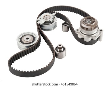 Repair kit: Timing belt with rollers, Tensioner pulley, Deflection pulley, Two rollers, Water pump and bolts isolated on white background. Automobile spare part