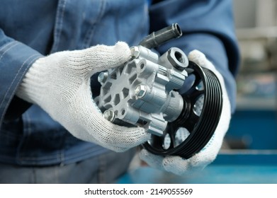 Repair and maintenance of the car in the service center.Spare parts. Power steering pump. - Shutterstock ID 2149055569