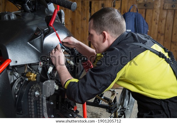 Repair and maintenance of snowmobiles.\
Maintenance of motor\
vehicles.