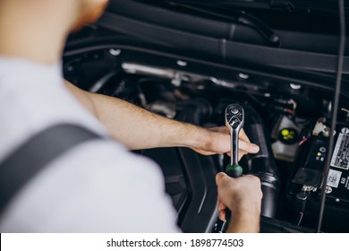 Repair Man Making Car Service