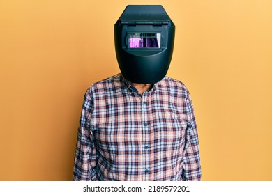 Repair Man Wearing Professional Welding Mask Over Head Covering Face For Protection