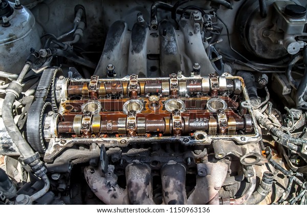 Repair of an old auto\
engine