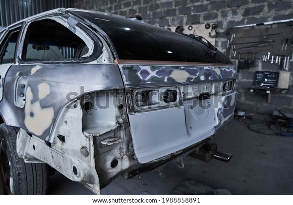 Repair of an old\
broken car at auto\
service