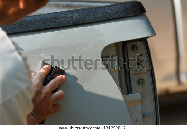 Repair and painting car car mechanic ,Spray paint\
hazards,dangerous work.