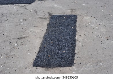 Repair Pavement And Laying New Asphalt Patching Method Outdoors. Road Repair.