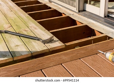 Repair and replacement of an old wooden deck or patio with modern composite plastic material