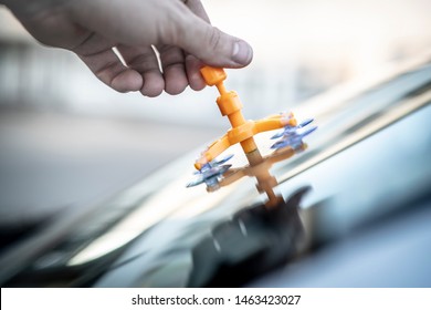 Repair Of A Rockfall In The Windshield Of A Car