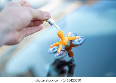 Repair Of A Rockfall In The Windshield Of A Car