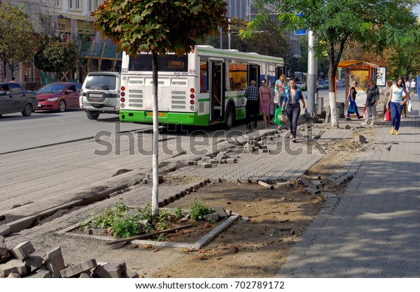 Repair of sidewalk, preparation for the FIFA World\
Cup 2018. Bolshaya Sadovaya Street, Rostov-on-Don, Russia. August\
24, 2017
