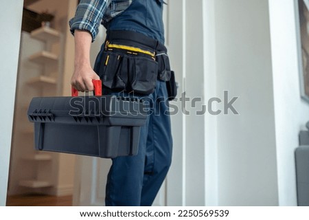 Repair technician arriving at a client house