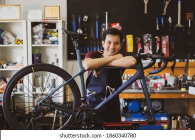 Repair technician  bicycles was repaired gear bike shop. - Powered by Shutterstock