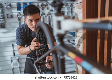 Repair Technician Bicycles Was Repaired Gear Bike Shop.