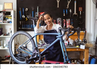 Repair Technician Woman Bicycles Was Repaired Gear Bike Shop.