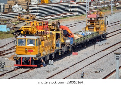 Repair train. Diesel rail car on the siding railway track