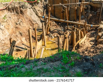 Repair Of Underground Utilities Underground. Repair Of Water Supply Networks. Replacement Of The Old Pipeline. Laying Of The Pipeline Underground.A Trench For The Repair Of Construction Communications