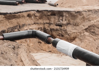 Repair of the water line of the heating main pipe in the ground trench pipeline at the construction site work industry.