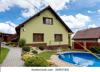 Repaired Rural House, Fixed Facade, Insulation And Painted To Green  Color Witg Swimming Pool