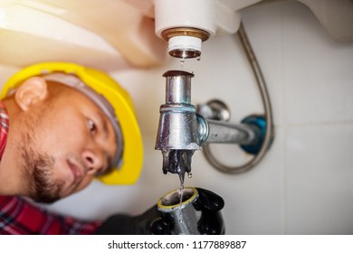 Repairing Clogged And Leaky Washbasin Sewer In The Bathroom