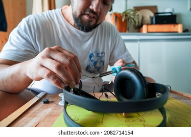 Repairing Electronic Circuit Board Inside Headphones With Soldering Iron At Home. DIY Project.