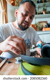 Repairing Electronic Circuit Board Inside Headphones With Soldering Iron At Home. DIY Project.