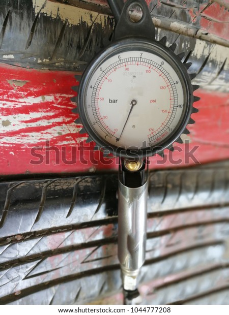 repairing flat car tire with repair kit for
abstract background