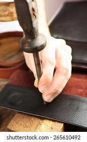 Repairing Leather Bag In Workshop