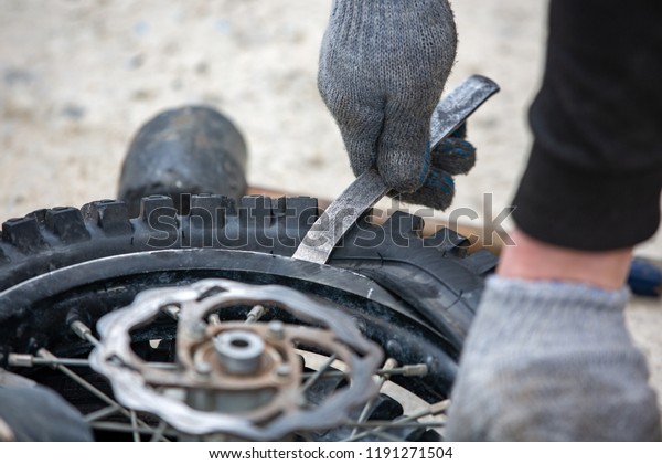 repairing motorcycle tire with repair kit, Tire\
plug repair kit for tubeless\
tires.