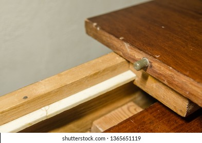 repairing one old wooden table at home. Repair or overhaul concept.  - Shutterstock ID 1365651119
